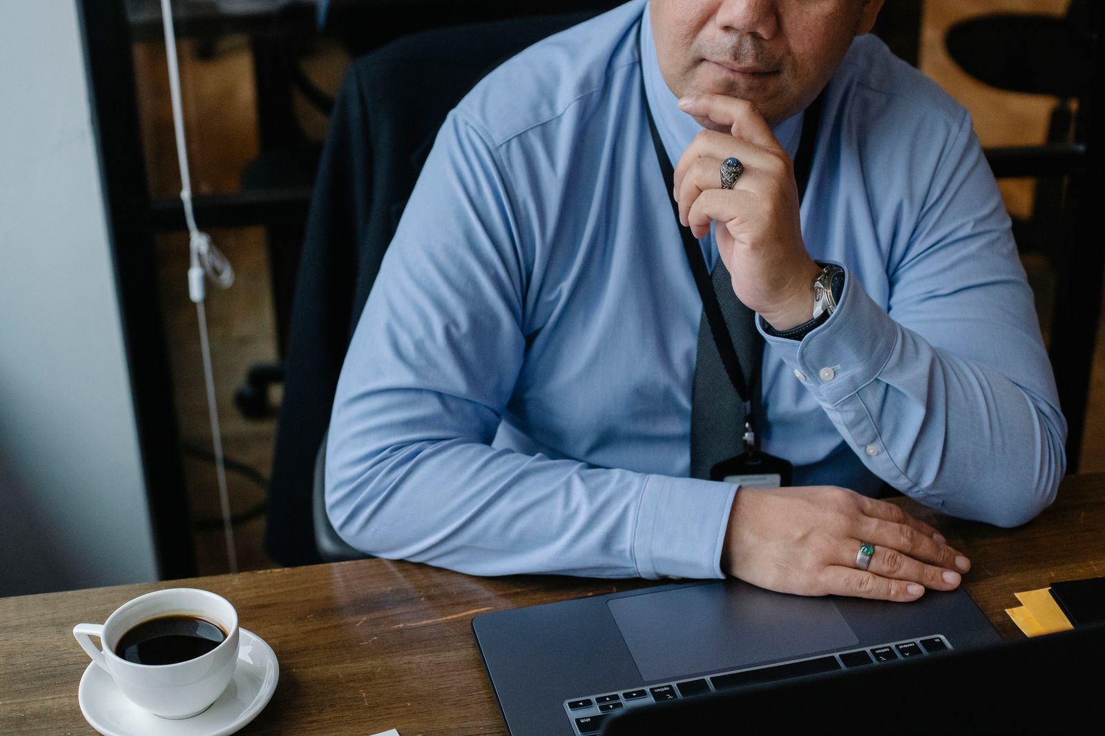 Pizza franchisor reviewing multi-location performance on a laptop
